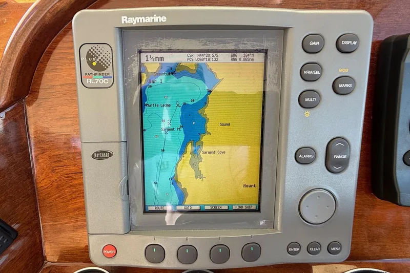 Slide: The Image of Raymarine RL70C navigation system on 2001 Hinckley Classic Picnic Boat dashboard. - 31