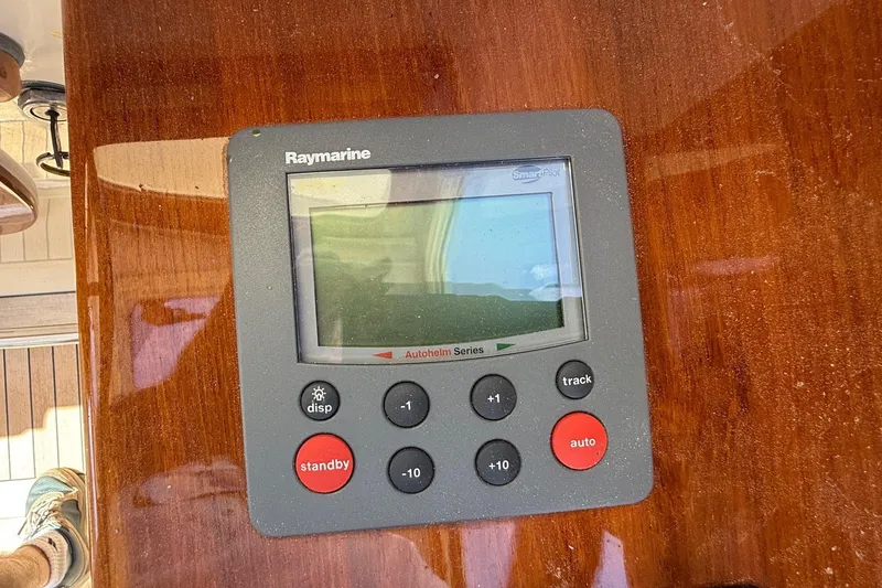 Slide: The Image of Raymarine navigation display on 2001 Hinckley Classic Picnic Boat dashboard. - 35