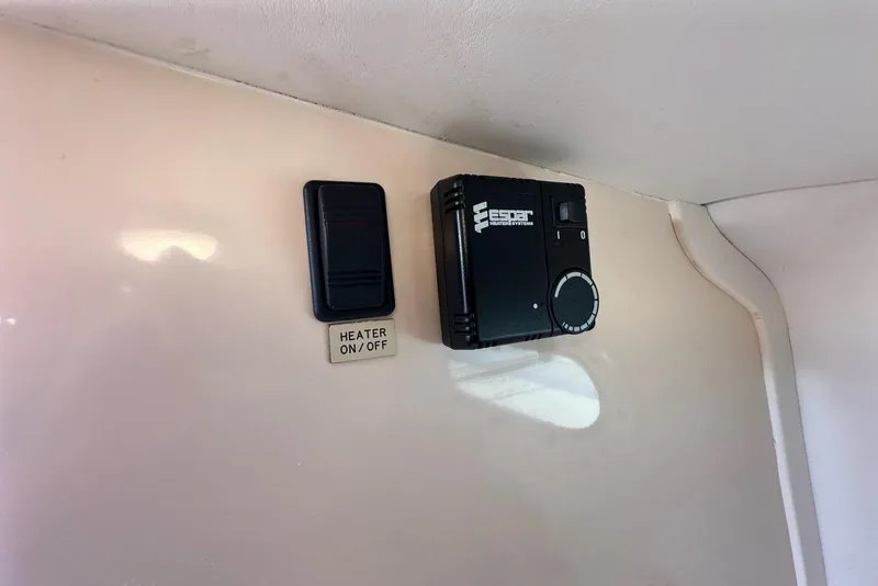 Slide: The Image of Heater control panel in 2002 True North 38 Heritage boat interior. - 25
