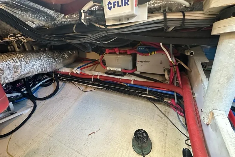 Slide: The Image of Engine room of 2002 True North 38 Heritage boat with wiring and equipment. - 33