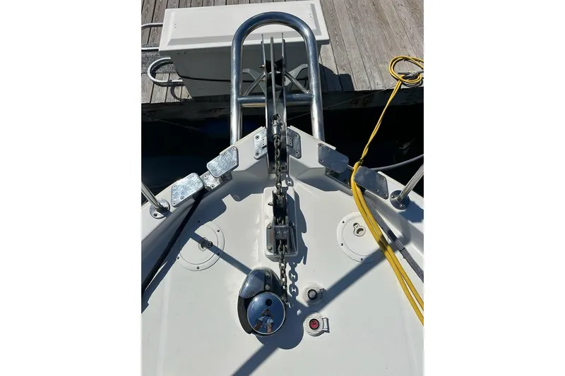 Slide: The Image of Bow of 2002 True North 38 Heritage boat with anchor chain and dock. - 35