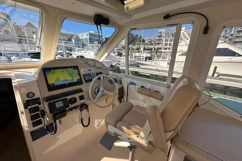 Slide: The Image of Interior of 2002 True North 38 Heritage boat with navigation equipment and helm station. - 6