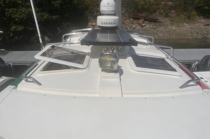 Slide: The Image of 2013 Cutwater 28 LE boat with Garmin radar and solar panel on deck. - 10