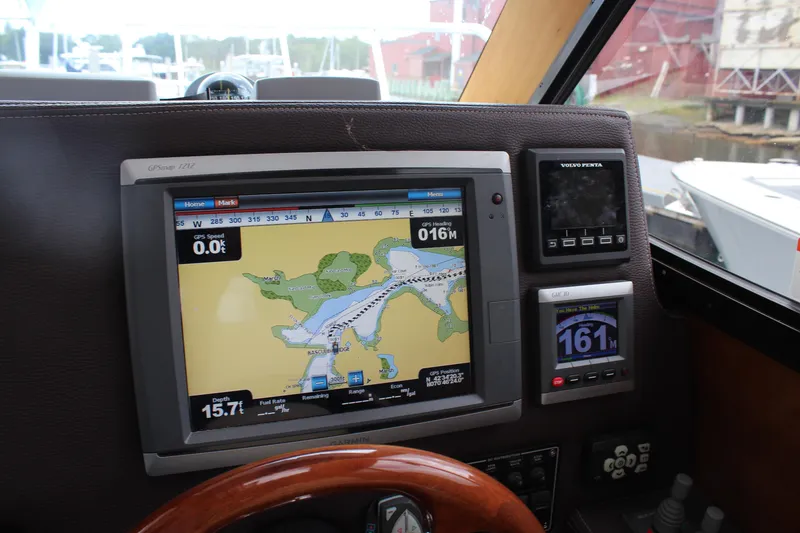 Slide: The Image of Dashboard of 2013 Cutwater 28 LE boat with navigation and control systems. - 25