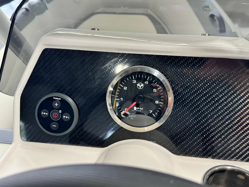 Slide: The Image of Dashboard of 2024 Highfield Classic 380 Grand Tour with carbon fiber finish and RPM gauge. - 13
