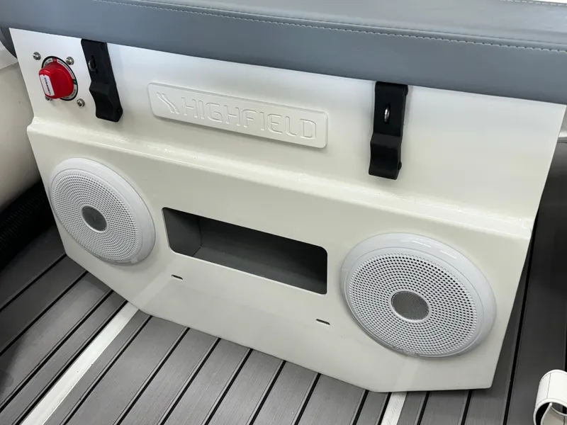 Slide: The Image of 2024 Highfield Classic 380 Grand Tour boat interior with speakers and control panel. - 18