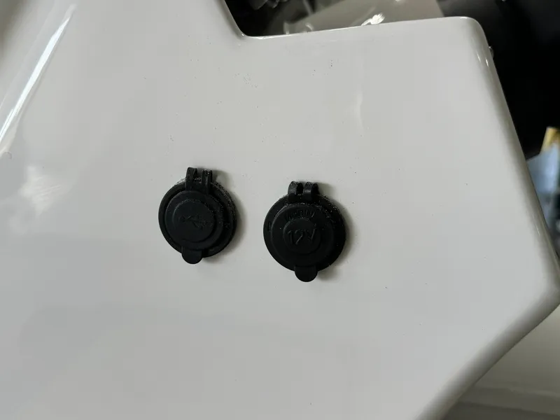 Slide: The Image of Close-up of two black caps on a 2024 Highfield Classic 380 Grand Tour boat. - 19