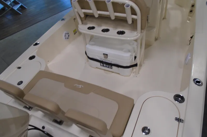Slide: The Image of 2026 Scout 231 XSB boat interior with seating and storage features. - 18