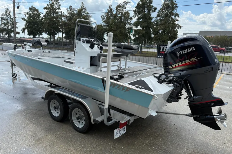 Slide: The Image of 2024 Alweld 2070cc boat with Yamaha outboard motor on a trailer. - 4
