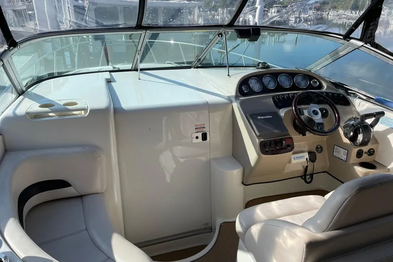 Slide: The Image of 2000 Chaparral Signature 300 boat cockpit with steering wheel and instrument panel. - 7