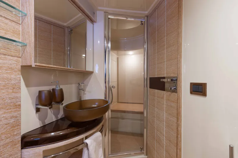 Slide: The Image of Luxurious bathroom on 2014 Azimut 60 Flybridge yacht with modern fixtures and elegant design. - 10