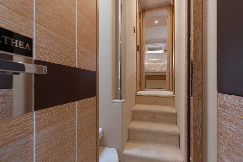 Slide: The Image of Luxurious interior hallway of 2014 Azimut 60 Flybridge yacht with carpeted stairs. - 13