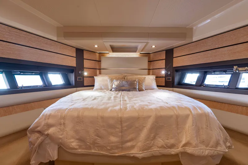Slide: The Image of Luxurious bedroom interior of 2014 Azimut 60 Flybridge yacht with elegant bedding and modern design. - 14