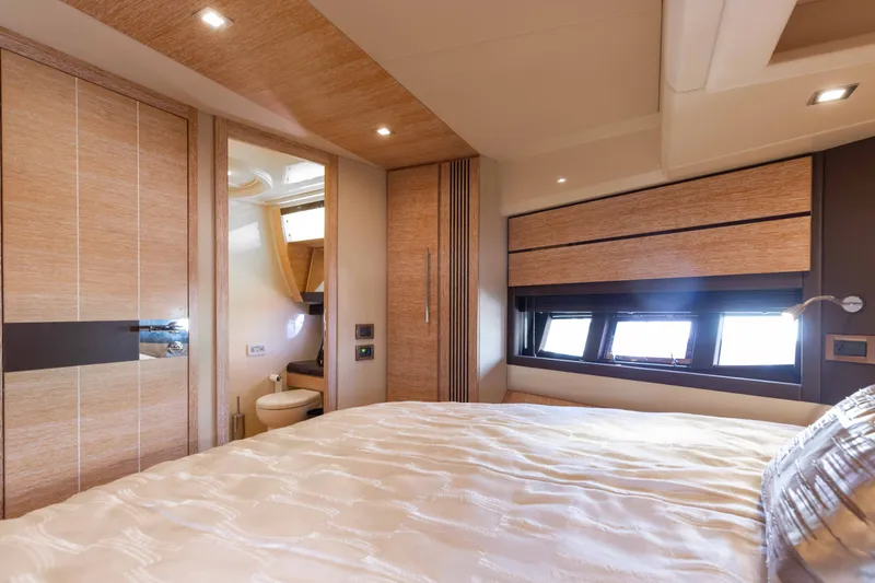 Slide: The Image of Luxurious bedroom interior of 2014 Azimut 60 Flybridge yacht with modern design elements. - 17