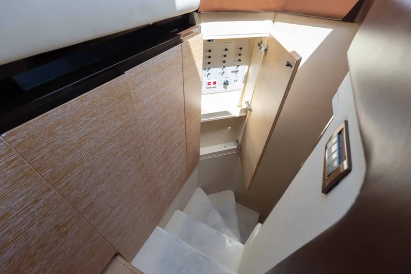 Slide: The Image of Interior of 2014 Azimut 60 Flybridge yacht showing stairs and electrical panel. - 22