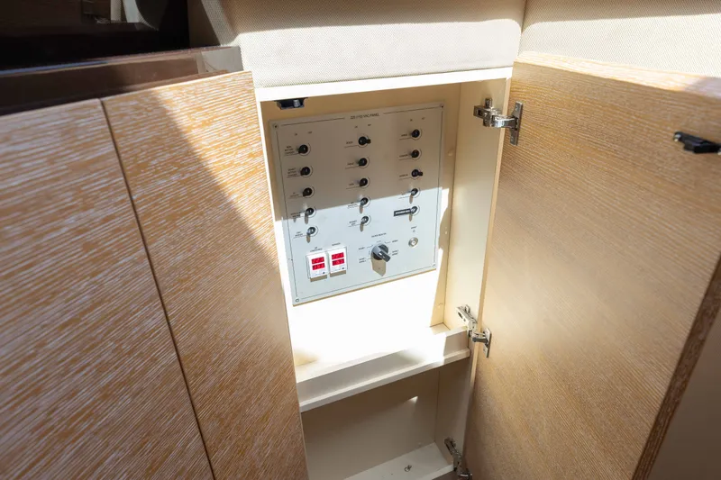 Slide: The Image of Electrical panel inside 2014 Azimut 60 Flybridge yacht cabinet. - 23