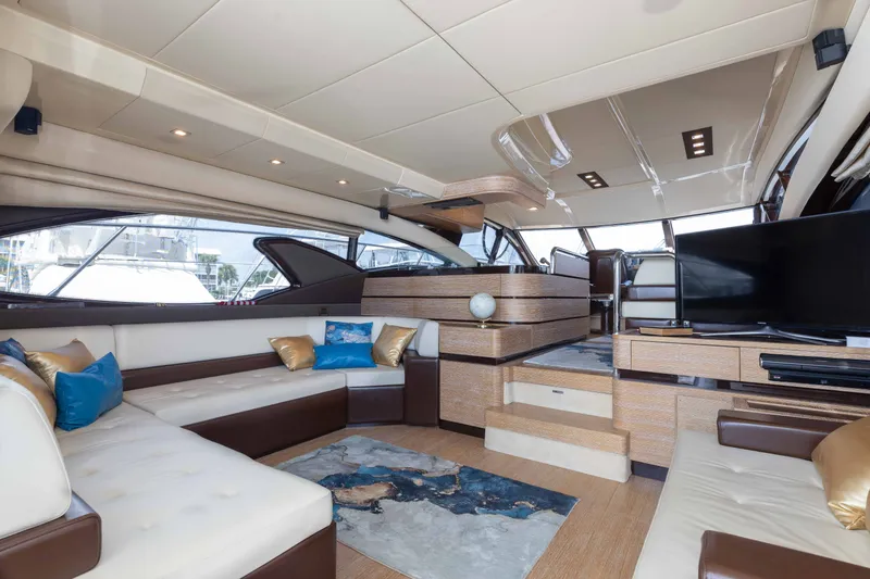Slide: The Image of Luxurious interior of 2014 Azimut 60 Flybridge yacht with elegant seating and modern decor. - 24