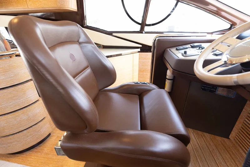 Slide: The Image of Luxurious leather captain's chair in 2014 Azimut 60 Flybridge yacht cockpit. - 36