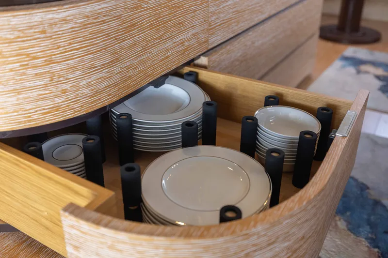 Slide: The Image of Drawer with neatly stacked plates on Azimut 60 Flybridge yacht, 2014 model. - 49