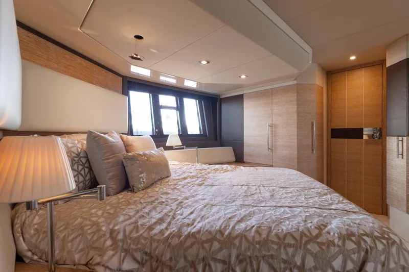 Slide: The Image of Luxurious bedroom interior of 2014 Azimut 60 Flybridge yacht with elegant decor and soft lighting. - 7