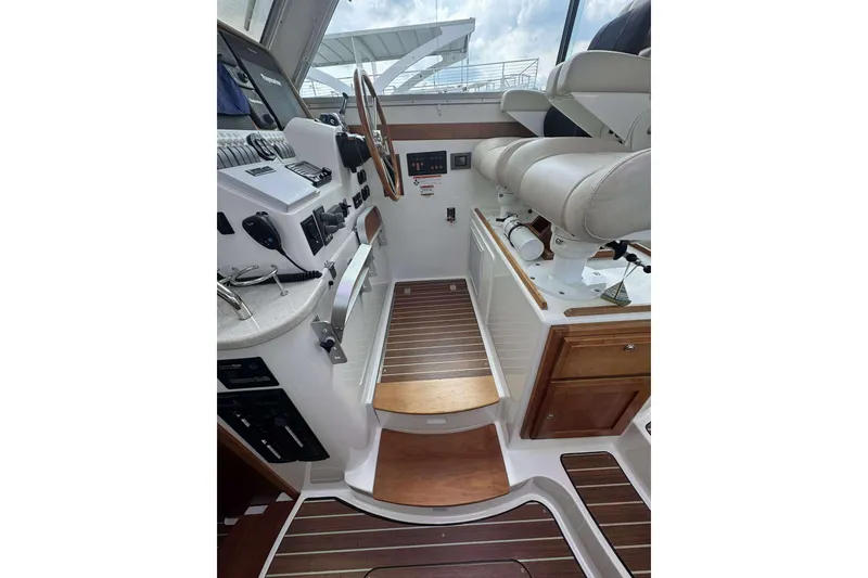 Slide: The Image of Display screen showing Mercury Marine engine hours at 440.5 on a 2016 Back Cove 37. - 23