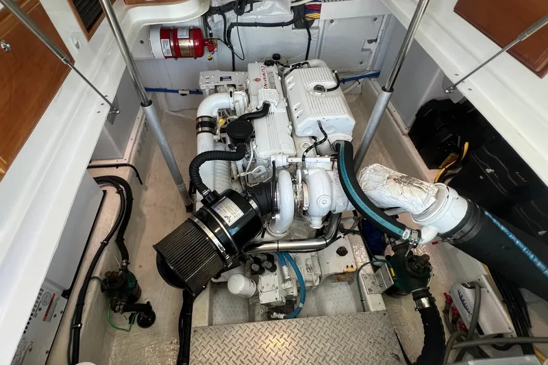 Slide: The Image of 2016 Back Cove 37 yacht docked at marina with clear blue sky. - 32