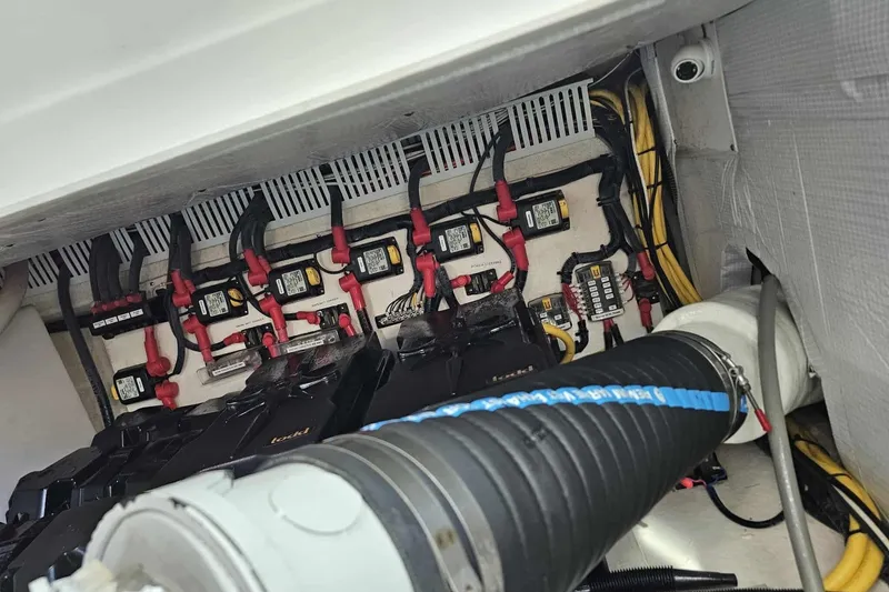 Slide: The Image of Engine room of a 2016 Back Cove 37 boat, featuring a Cummins engine. - 35