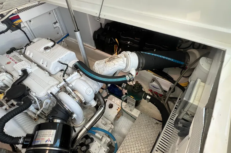 Slide: The Image of Engine compartment of a 2016 Back Cove 37 boat, featuring a Cummins engine. - 37