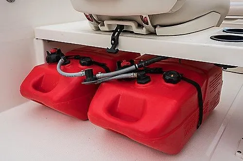 Slide: The Image of 2026 Boston Whaler 160 Super Sport with dual red fuel tanks under seat. - 5