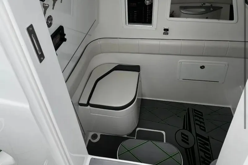 Slide: The Image of 2024 Deep Impact 399 Sport boat interior with modern seating and sleek design. - 14