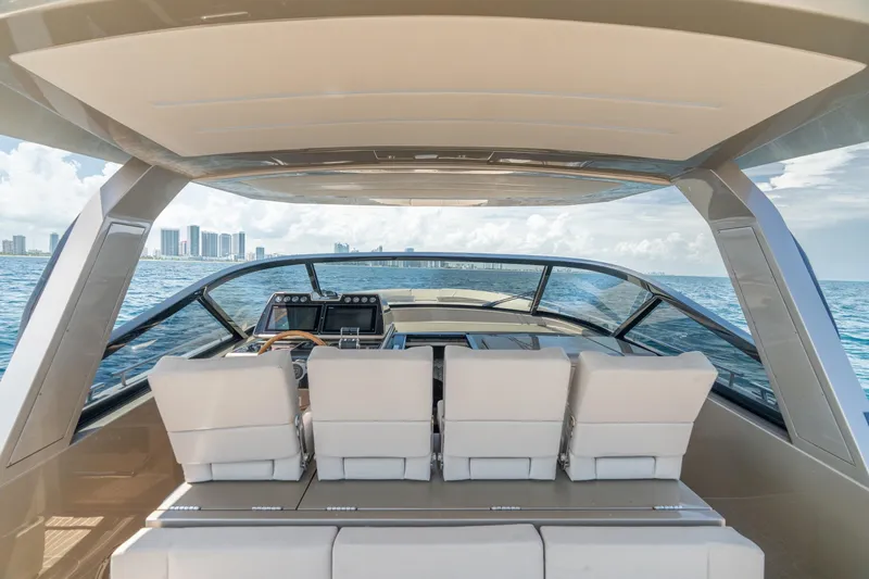 Slide: The Image of Luxurious 2019 CNM Continental 54 yacht interior with ocean view and modern dashboard. - 20