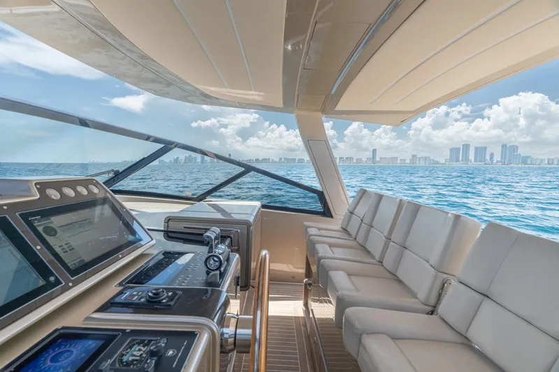 Slide: The Image of Luxurious 2019 CNM Continental 54 yacht interior with ocean and city skyline view. - 23