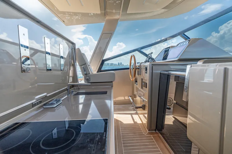 Slide: The Image of Luxurious 2019 CNM Continental 54 yacht interior with modern helm and sleek design. - 25