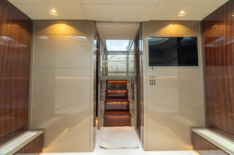 Slide: The Image of Luxurious interior of 2019 CNM Continental 54 yacht with modern design and TV. - 28