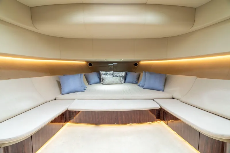 Slide: The Image of Luxurious interior of 2019 CNM Continental 54 yacht with elegant seating and ambient lighting. - 3