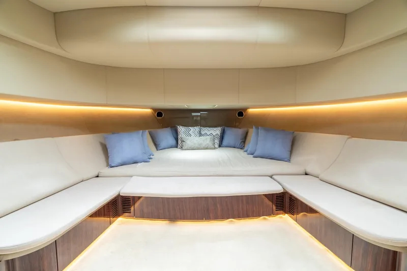 Slide: The Image of Luxurious interior of 2019 CNM Continental 54 yacht with elegant seating and ambient lighting. - 30