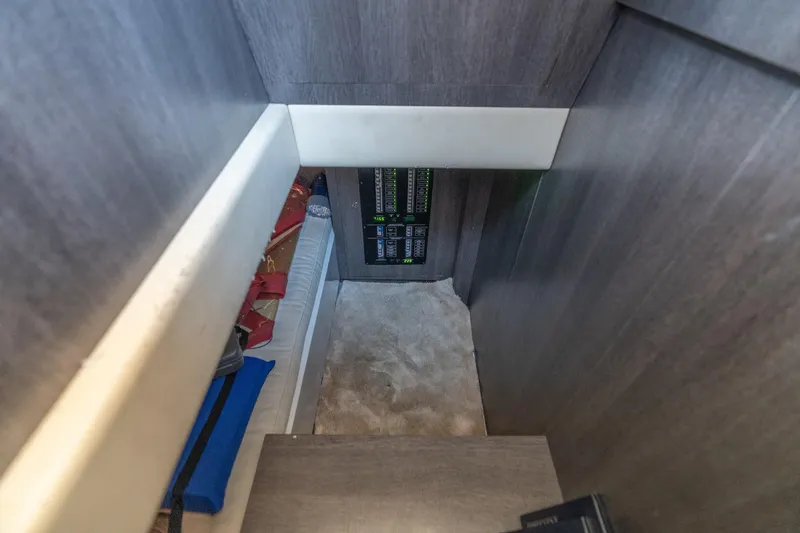 Slide: The Image of Interior view of 2019 CNM Continental 54 yacht with control panel and storage area. - 34