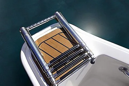 Slide: The Image of 2026 Boston Whaler 130 Super Sport boat ladder and deck detail. - 10