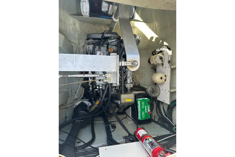 Slide: The Image of Engine compartment of a 2011 Robertson & Caine Leopard 46 catamaran, featuring mechanical components. - 14