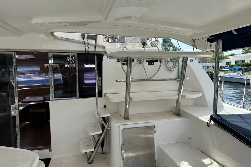 Slide: The Image of 2011 Robertson & Caine Leopard 46 yacht interior with helm and seating area. - 20