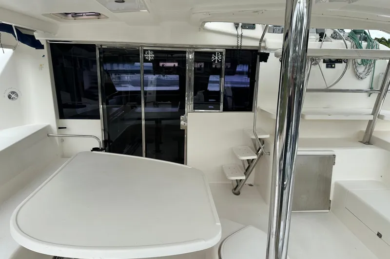 Slide: The Image of Interior view of 2011 Robertson & Caine Leopard 46 catamaran, featuring seating and helm area. - 22