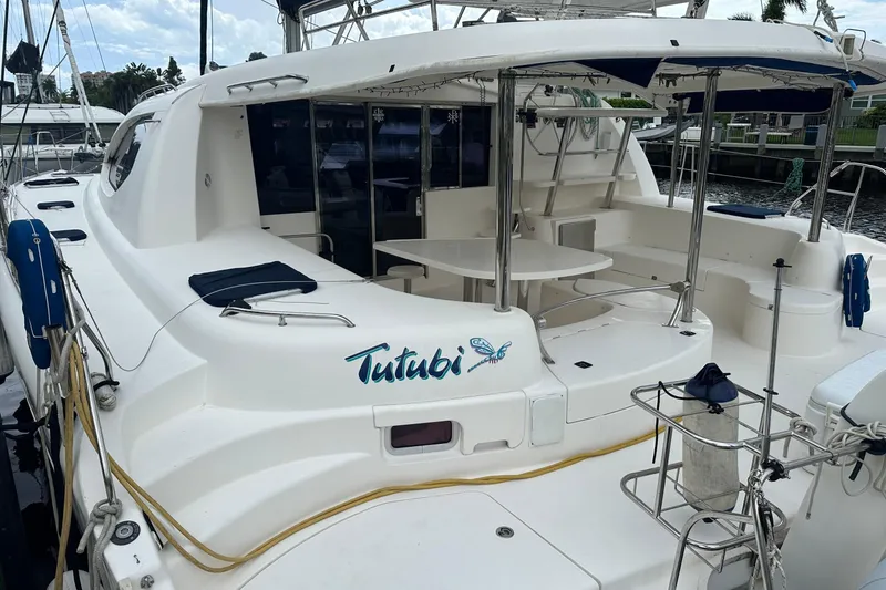 Slide: The Image of 2011 Robertson & Caine Leopard 46 catamaran with spacious deck and seating area. - 24