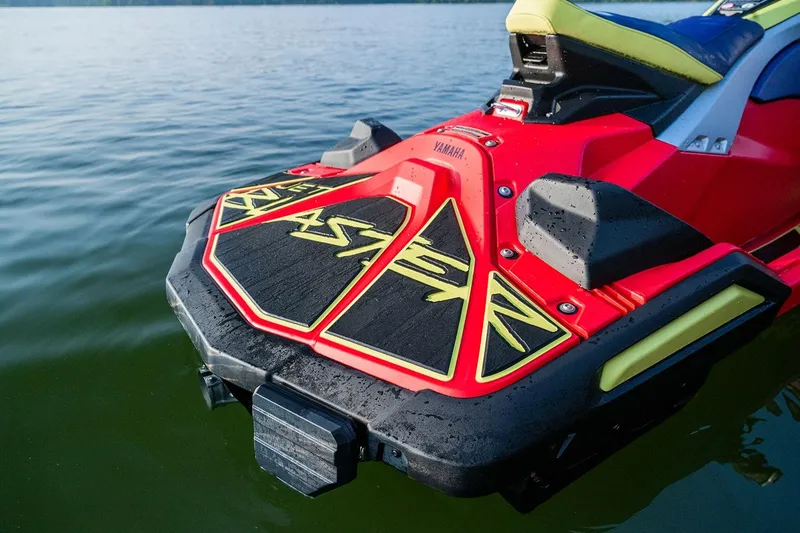 Slide: The Image of 2026 Yamaha WaveRunner JetBlaster PRO 2-Up in vibrant red and yellow, displayed indoors. - 3