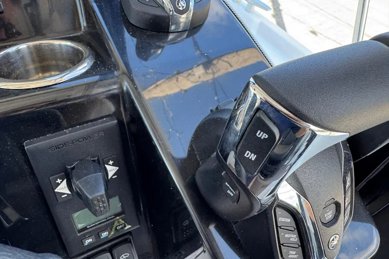 Slide: The Image of Control panel of 2026 Jeanneau NC 895 Series 2 boat with throttle and side-power controls. - 15