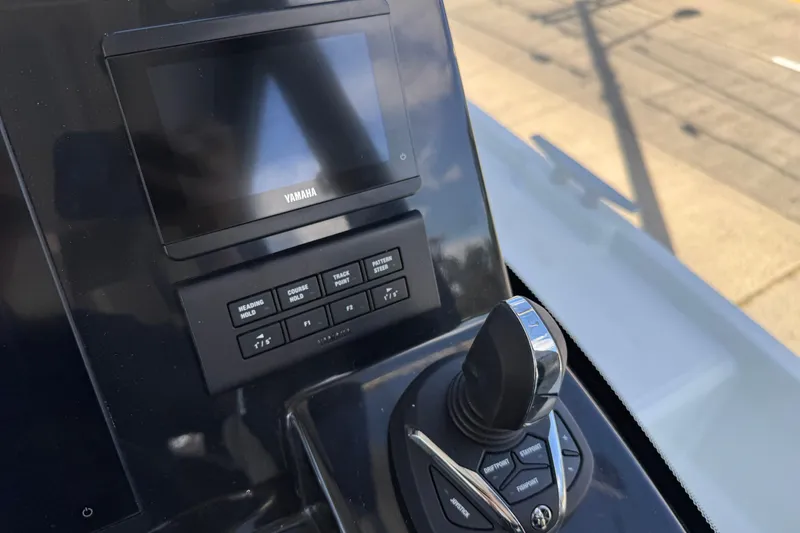 Slide: The Image of Control panel of 2026 Jeanneau NC 895 Series 2 with Yamaha display and joystick. - 18