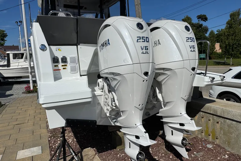 Slide: The Image of 2026 Jeanneau NC 895 Series 2 with twin Yamaha 250 V6 outboard engines. - 2