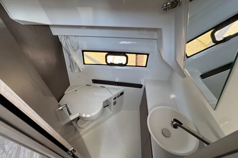Slide: The Image of 2026 Jeanneau NC 895 Series 2 bathroom with modern fixtures and compact design. - 24