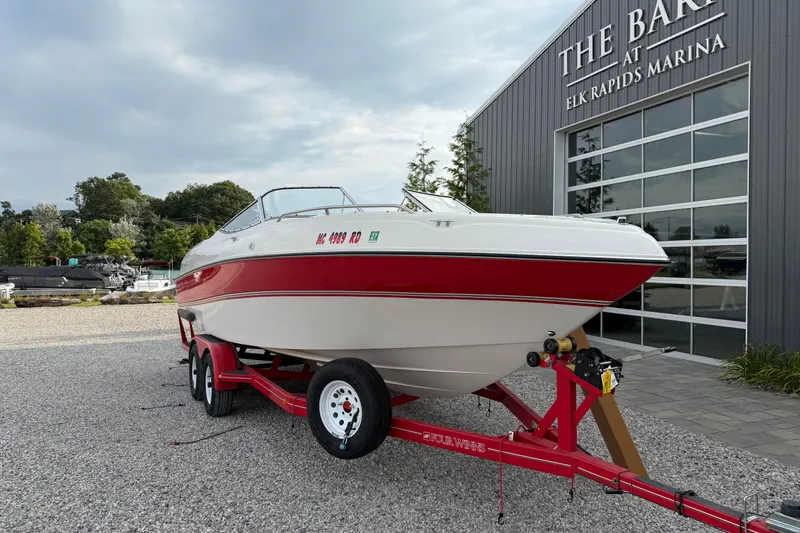 Slide: The Image of 1996 Four Winns 240 HORIZON DLX boat on trailer at Elk Rapids Marina. - 3