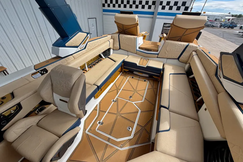 Slide: The Image of Luxurious interior of 2025 Nautique Super Air Nautique G25 Paragon with plush seating and modern design. - 25