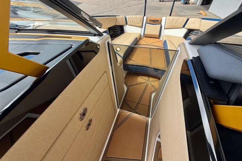 Slide: The Image of 2025 Nautique Super Air Nautique G25 Paragon interior with luxurious seating and modern design. - 32